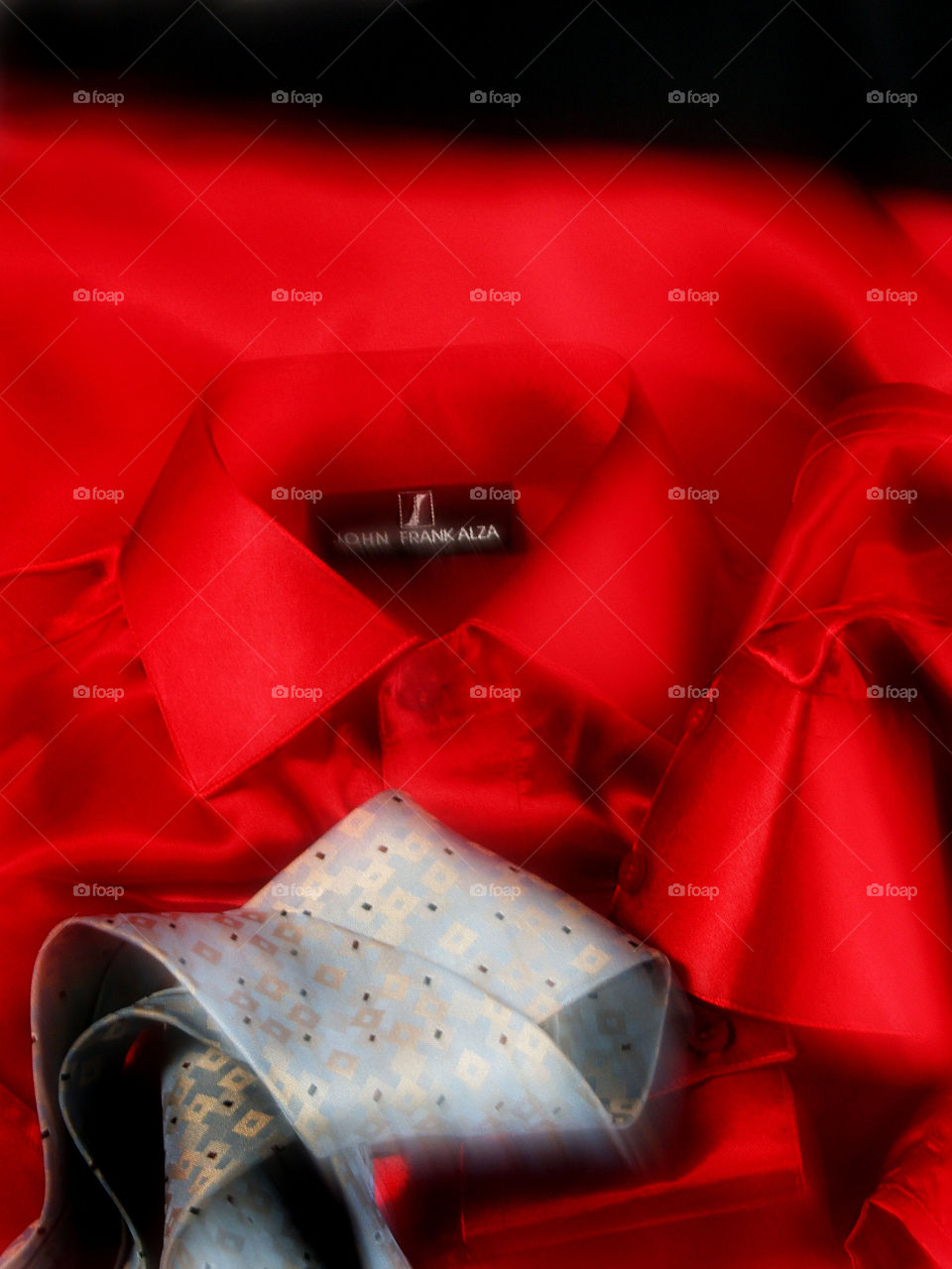 red shirt with tie man.