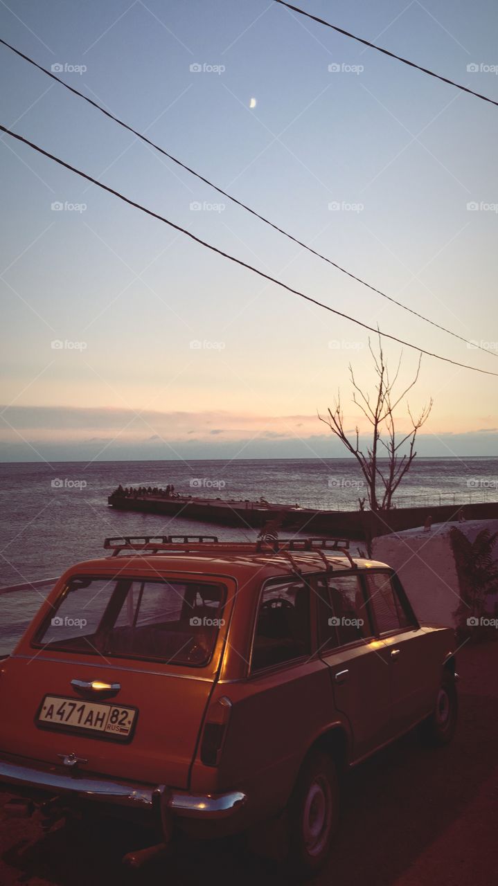 Retro car at the seashore 