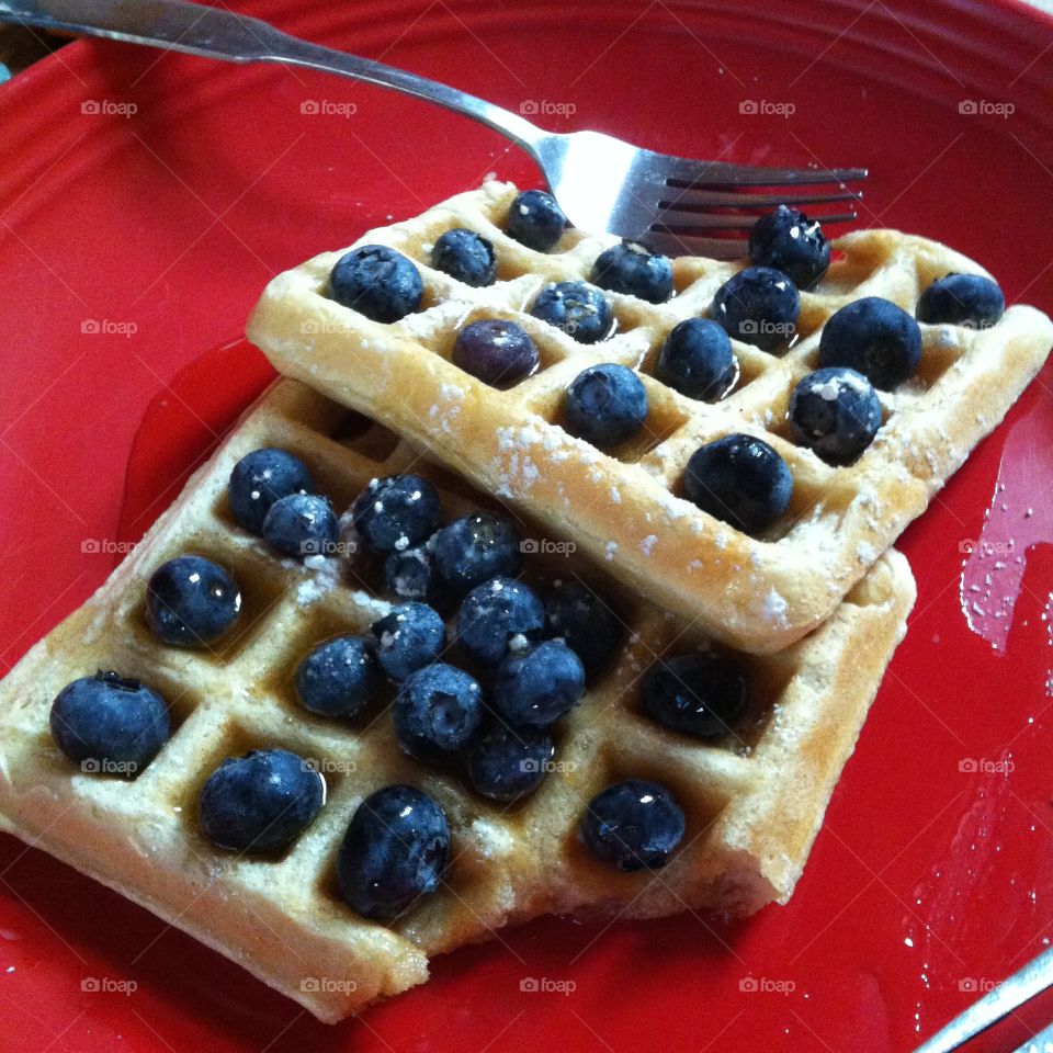 Close-up of waffles and blueberries