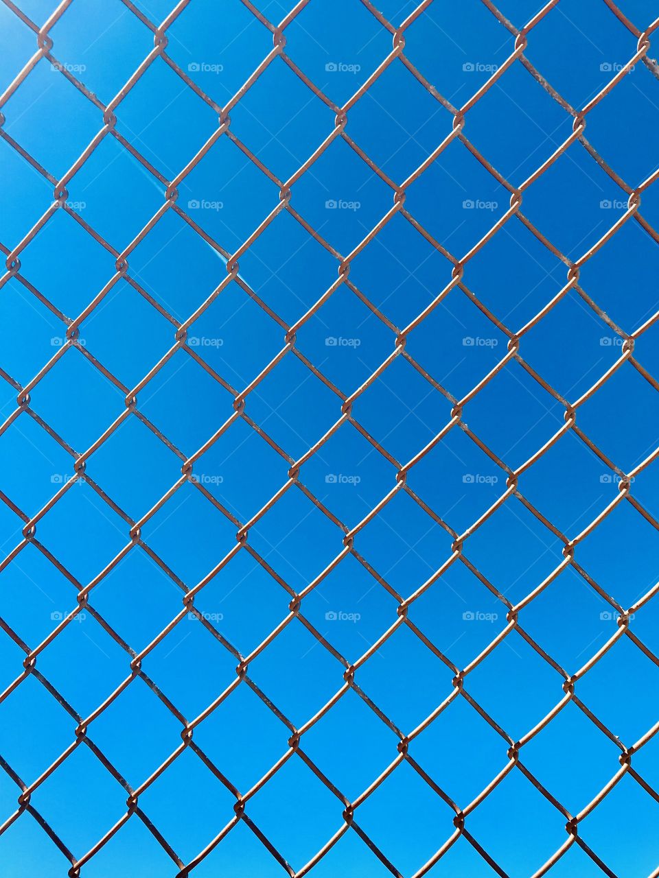 Sky blue through the fence 