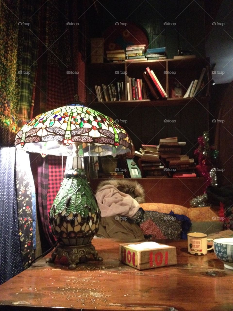 Stained glass lamp on the table in an art coffeeshop 