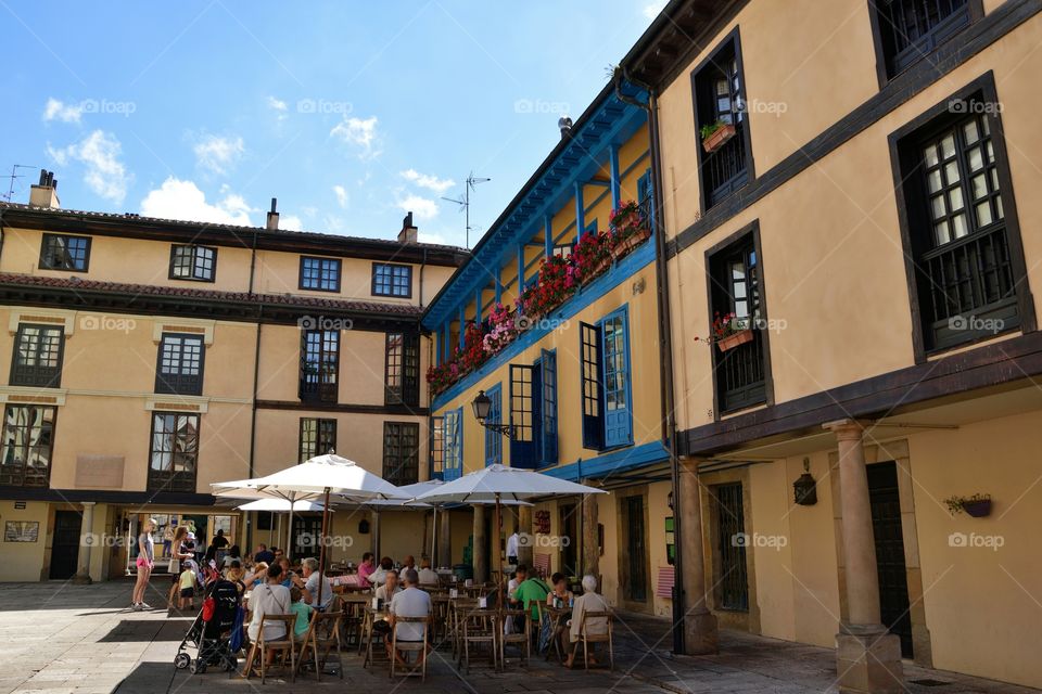 People relaxing at a street bar in Oviedo after a long day of sightseeing. Asturias, Spain.