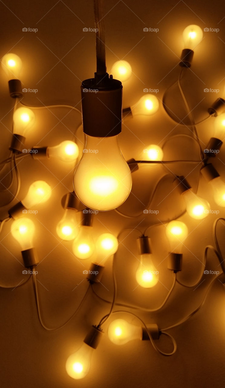 Many lit up bulbs with warm light