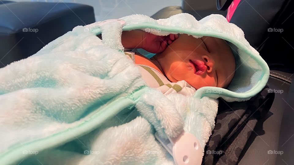 High angle view of cute baby boy sleeping in hospital