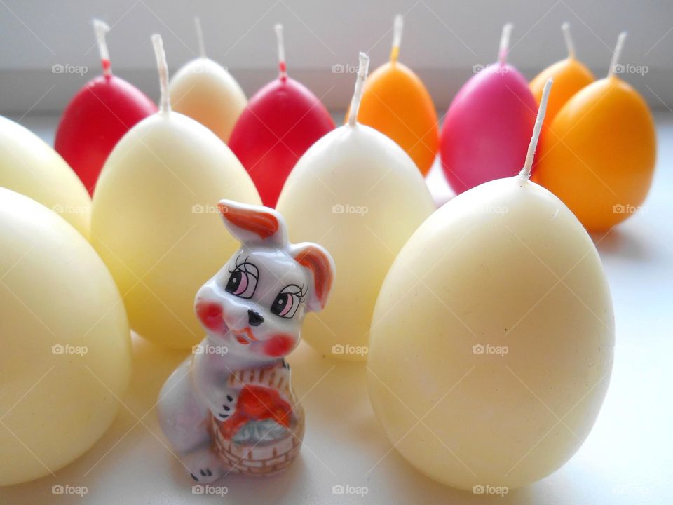 decorative rabbits souvenirs and colour eggs spring holiday, symbol New Year