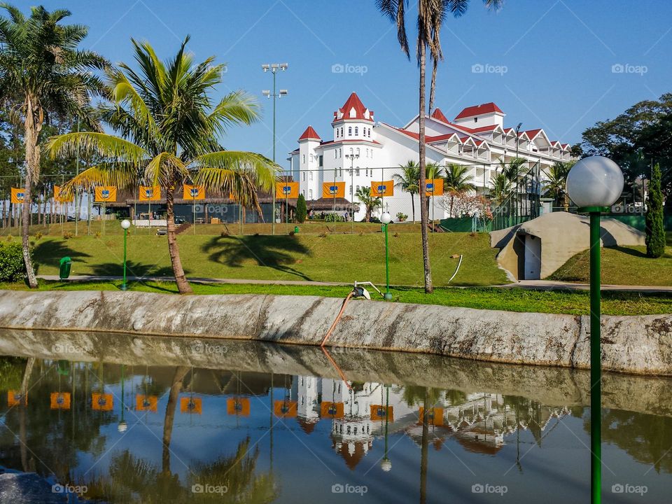 Beautiful Resort.  Reflection of the building and trees in the lake.