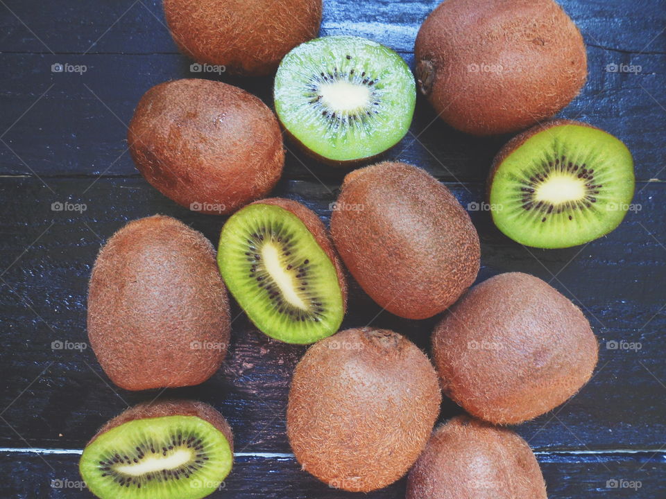 kiwi on a black background