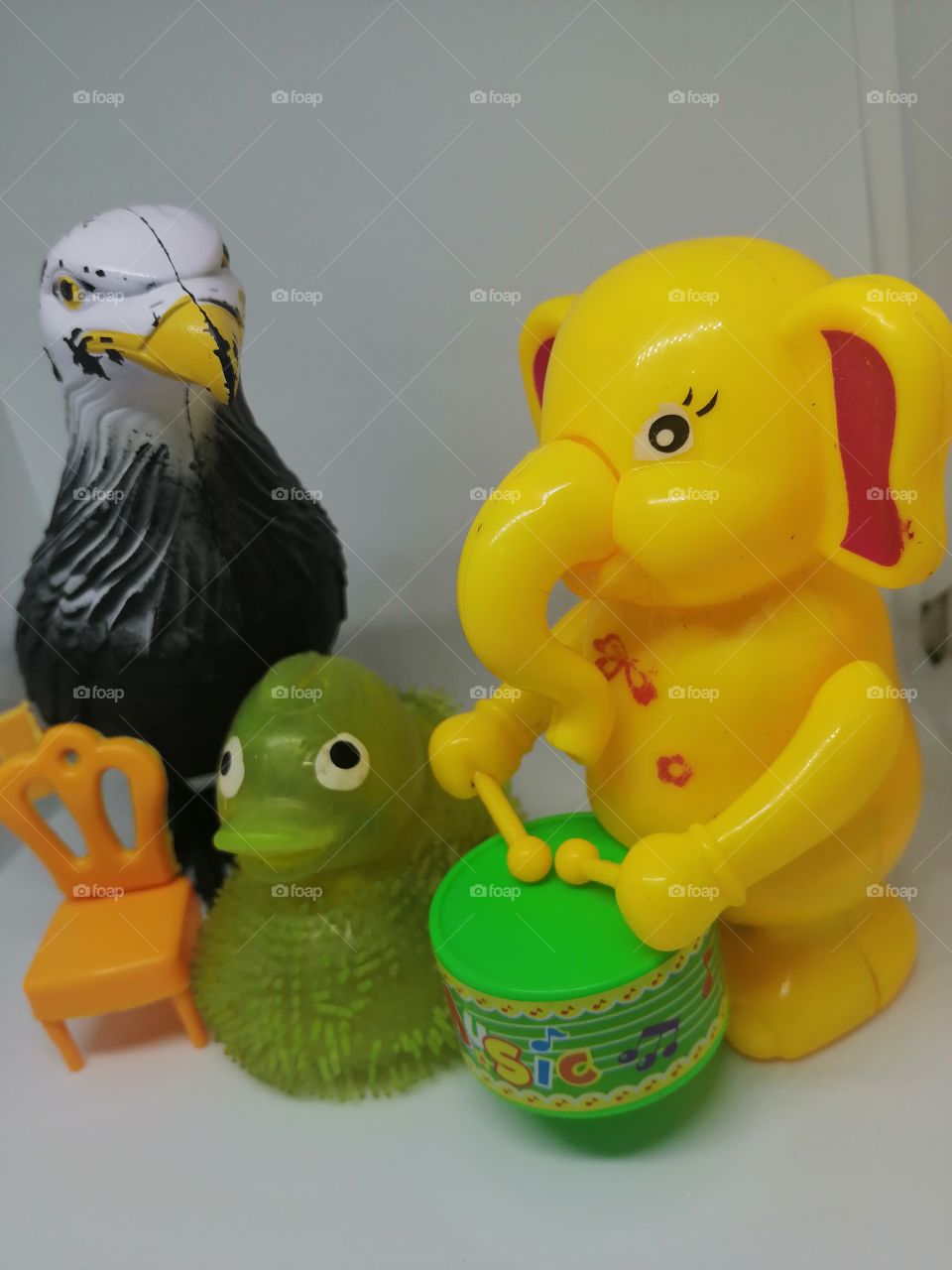 Toy Elephant beat drum with other toys looking so beautiful and express their Happiness with other .