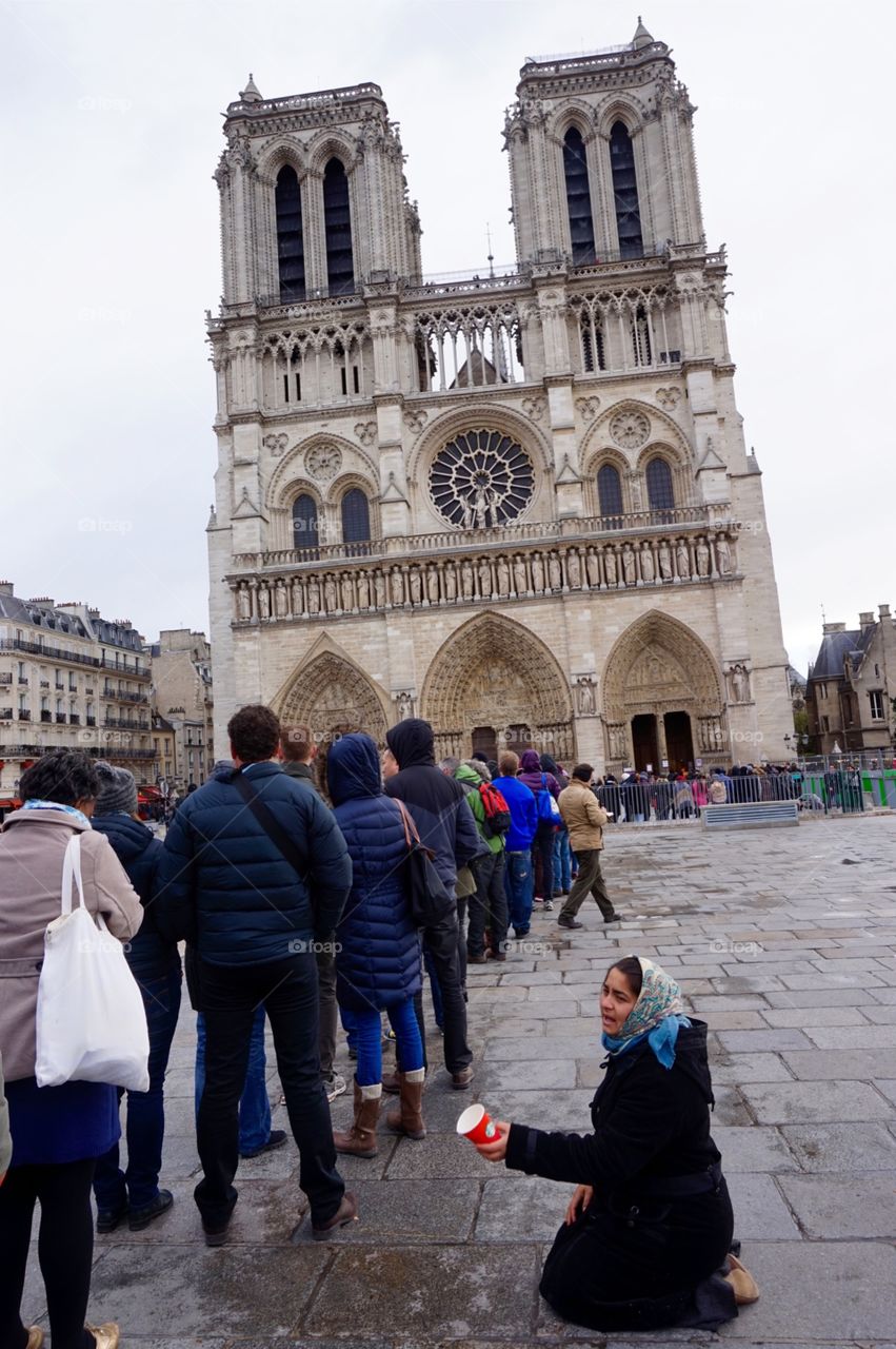 Beggar at Notre-Dame, Paris 