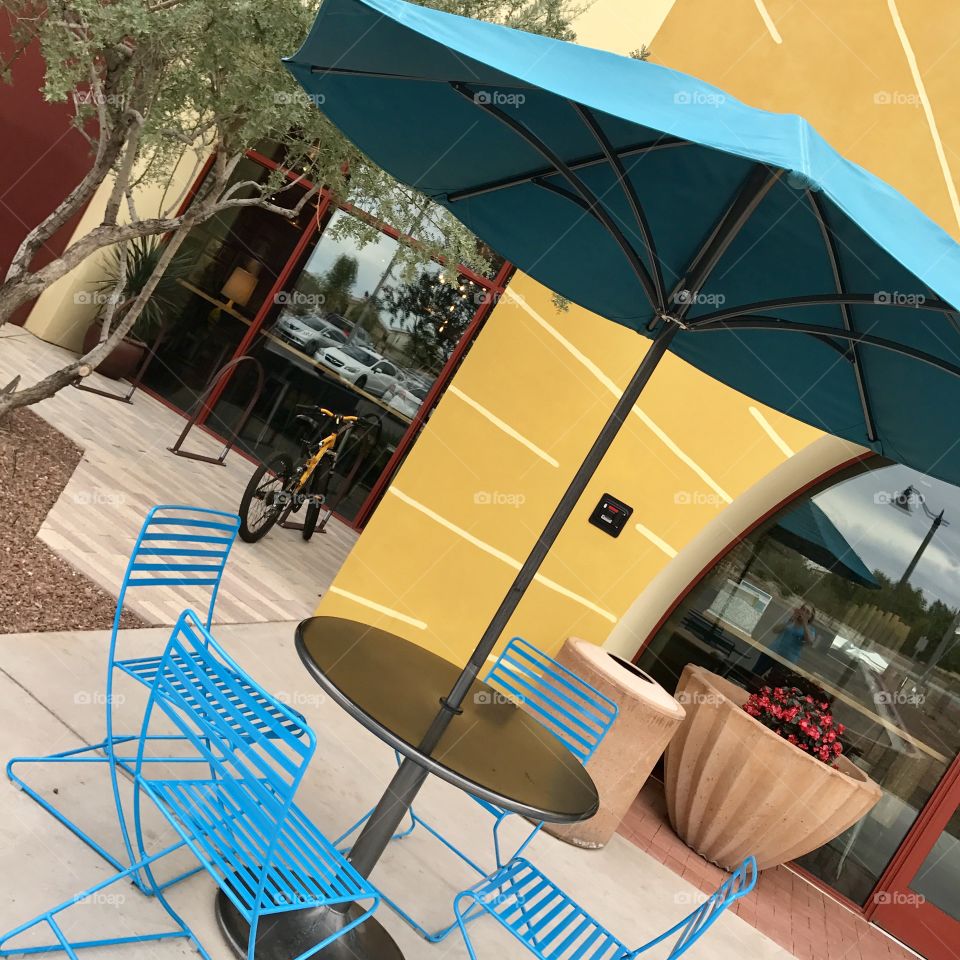 Table with Turquoise Umbrella