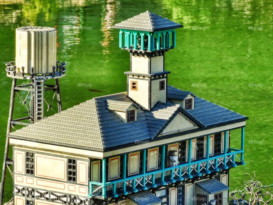 Mississippi River Lighthouse. Diorama Of A Harbor Scene
