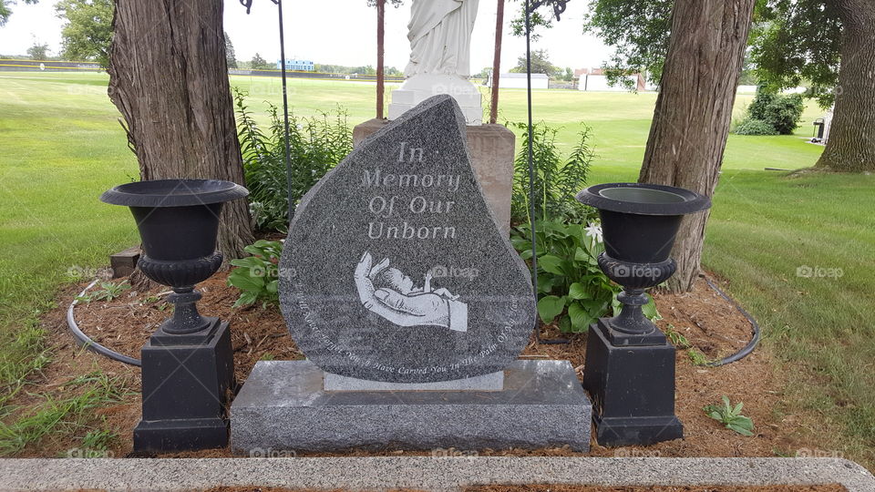 in loving Memory of unborn Rock Memorial in summer