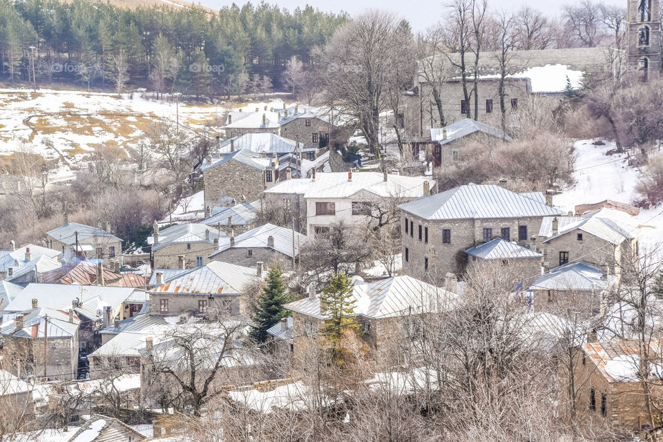 Traditional Snowy Village In Winter
