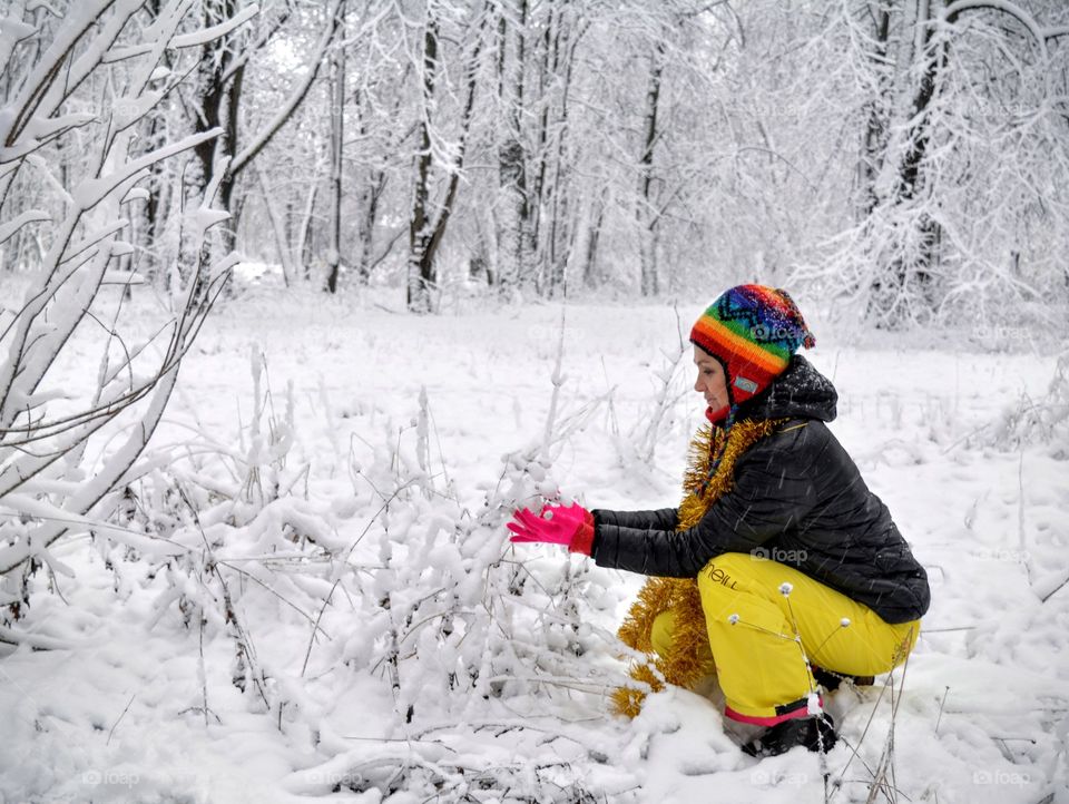 girl in the snowy park winter landscape
