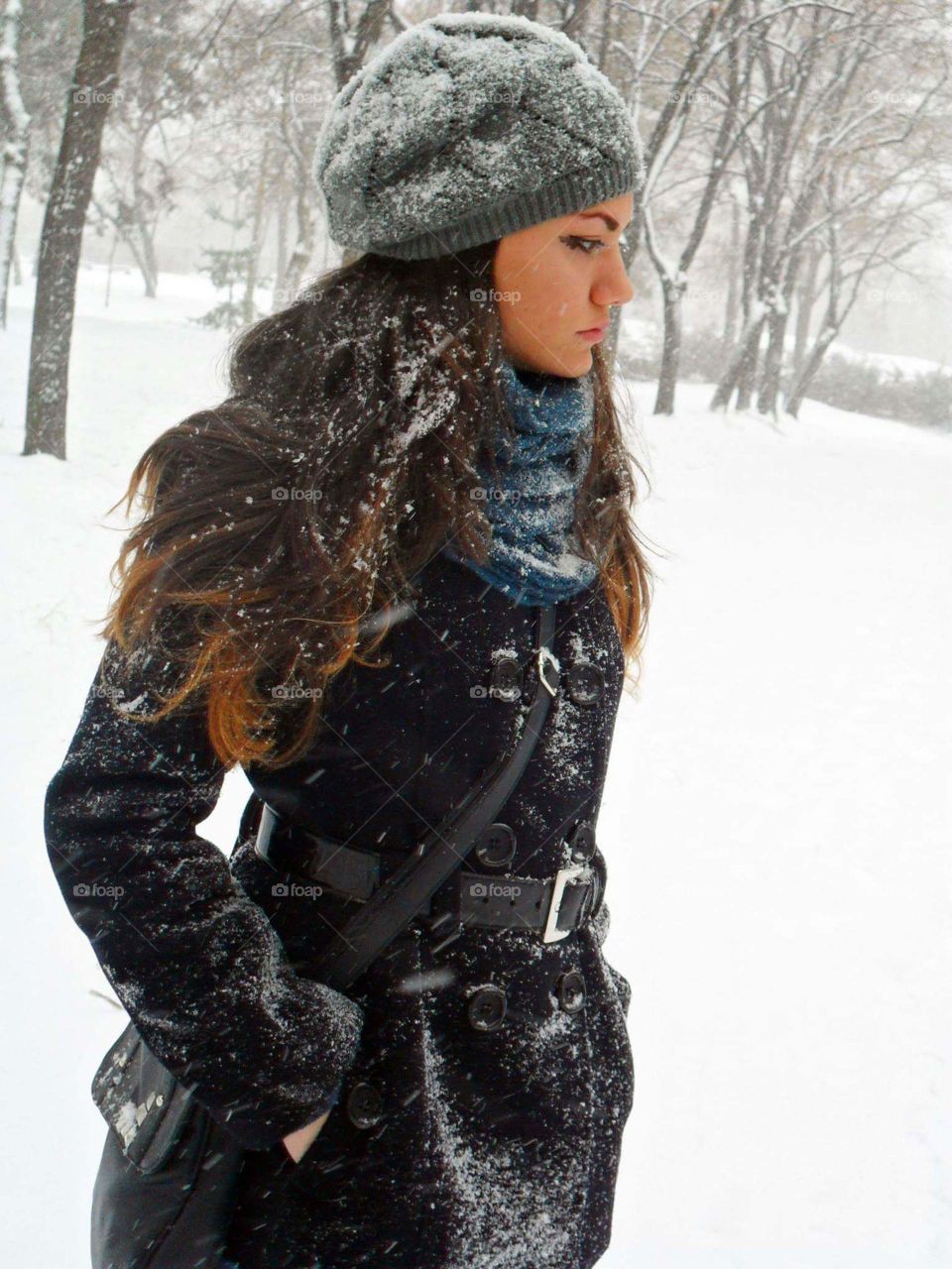 Winter girl. This was last year in Nish. The winter was very cold and cloudy. Me and my sister wanted to joy in snow.