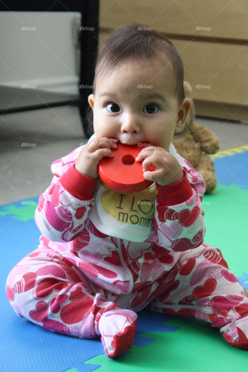 Baby playing with toy