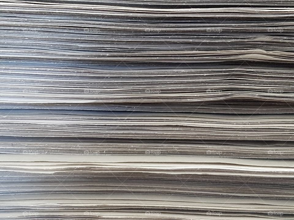 a stack of newspapers