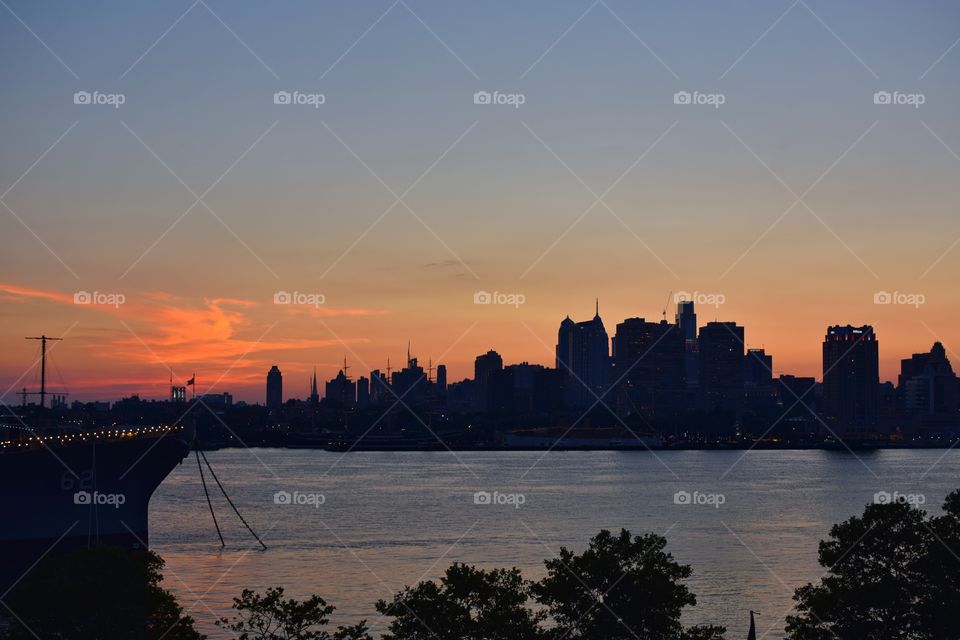Silhouette of a city during sunset