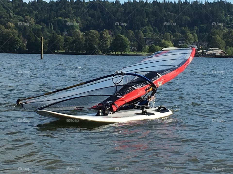 Windsurfer in ocean 