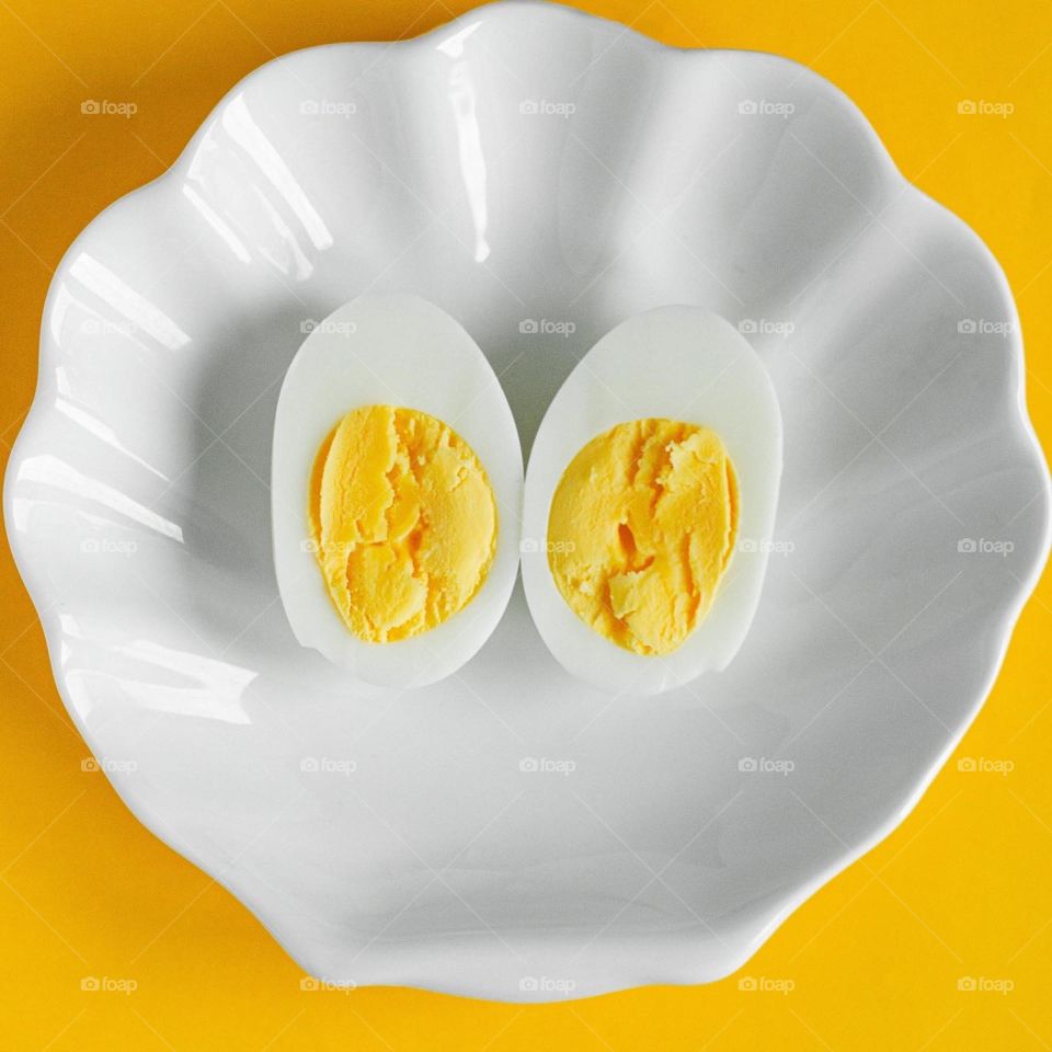 Eggs on the yellow background 