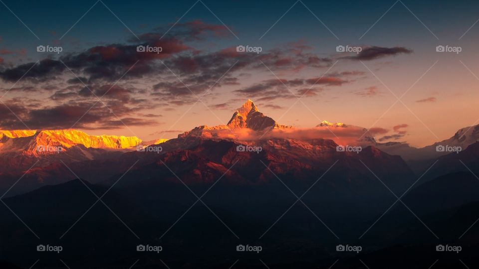 Golden sun rays over the Mount Fishtail, Pokhara, Nepal