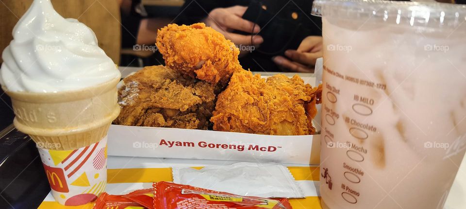 Mc Donald food: delicious chicken, ice cream, lychee drink