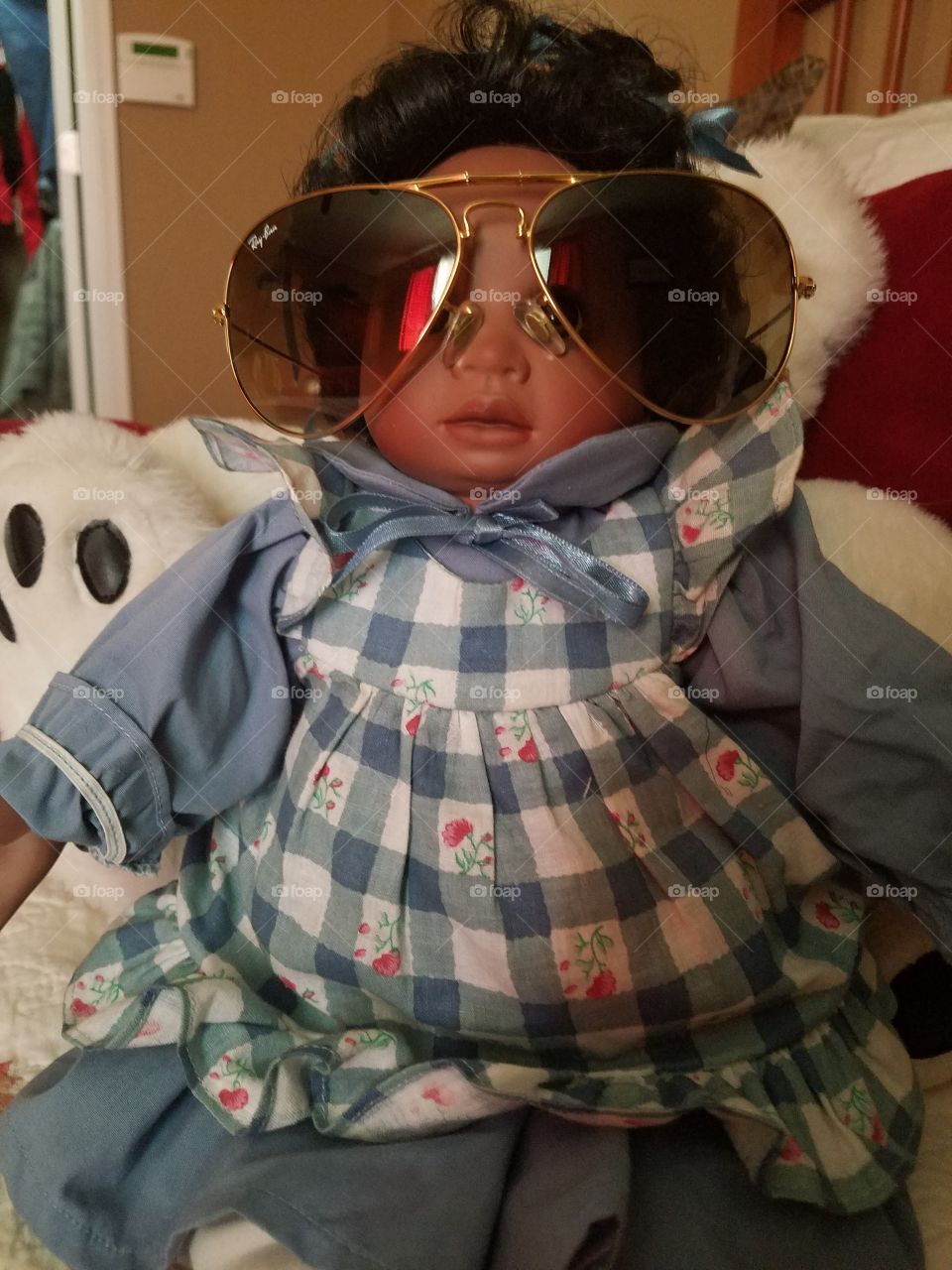 Close-up of doll with sunglasses