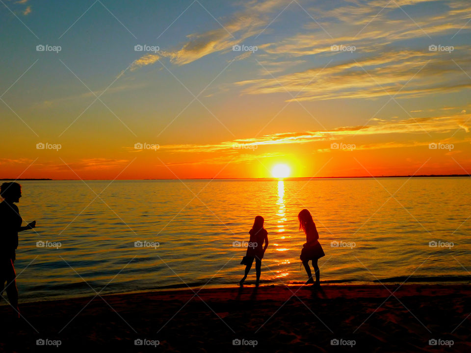 Amazing Silhouettes! Like the meeting of two worlds - the known and the unknown. The sun is like a great big romantic, inspirational fire in the sky. Brilliant streaks of yellow, orange, gold, blue, pink and red overcome the blue and purple of the sky. The sky resembled a prism; all the colors blended perfectly together. It's as if the colors and intensity of the light is just right! My work is done for today. I'm not sure what tomorrow will bring, but I'll be prepared for it!