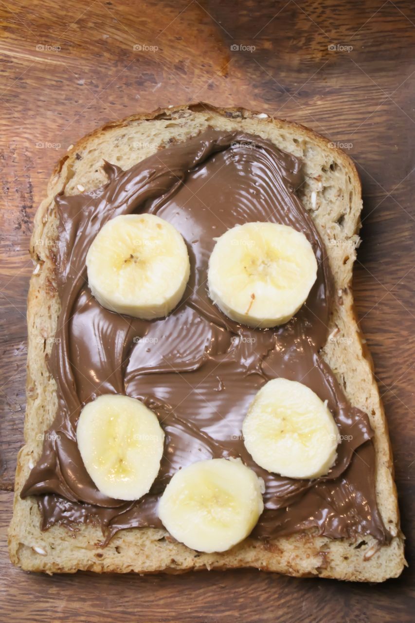 Smiley chocolate spread and banana sandwich 