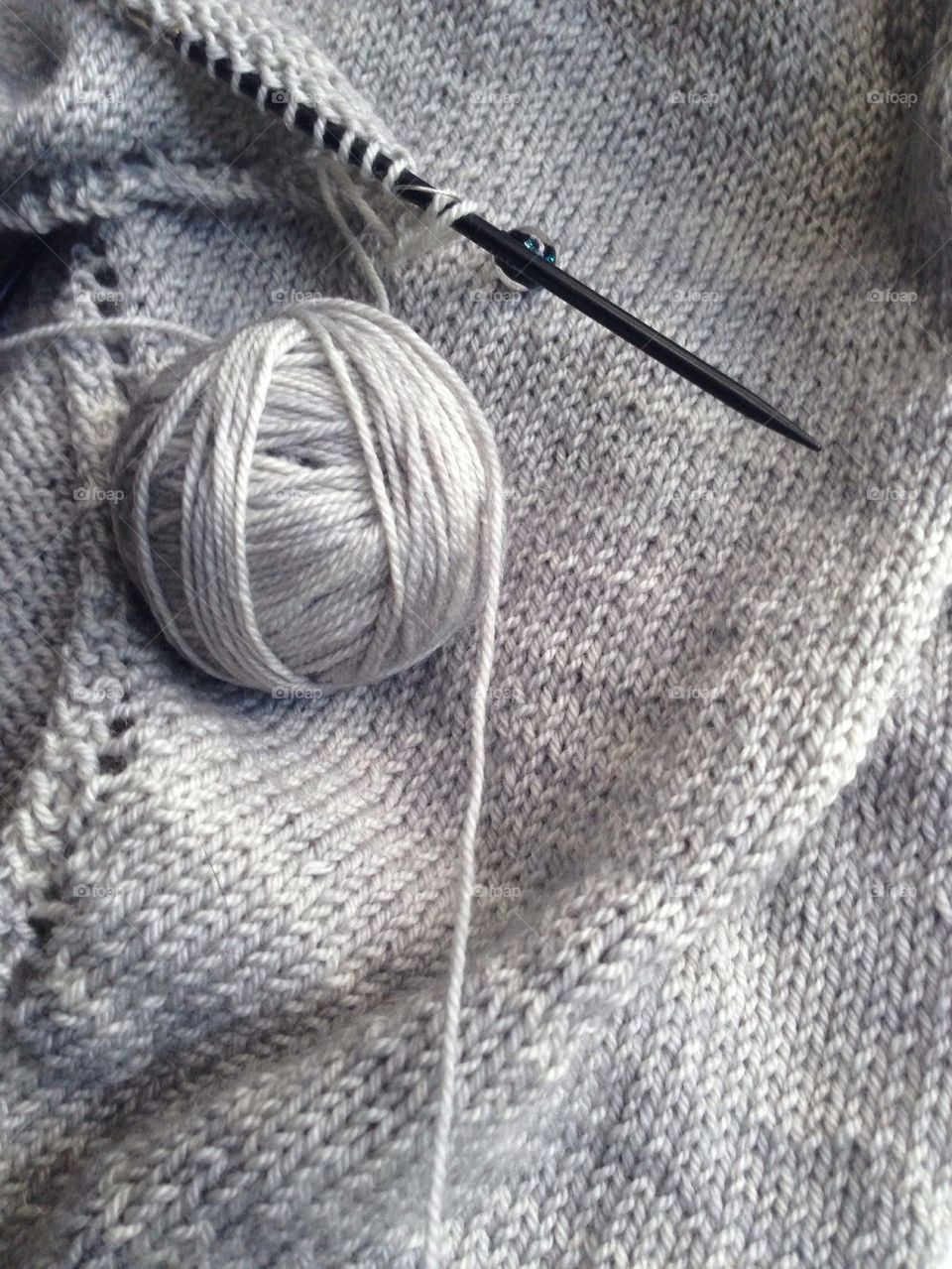 Knitting, in greyscale.
