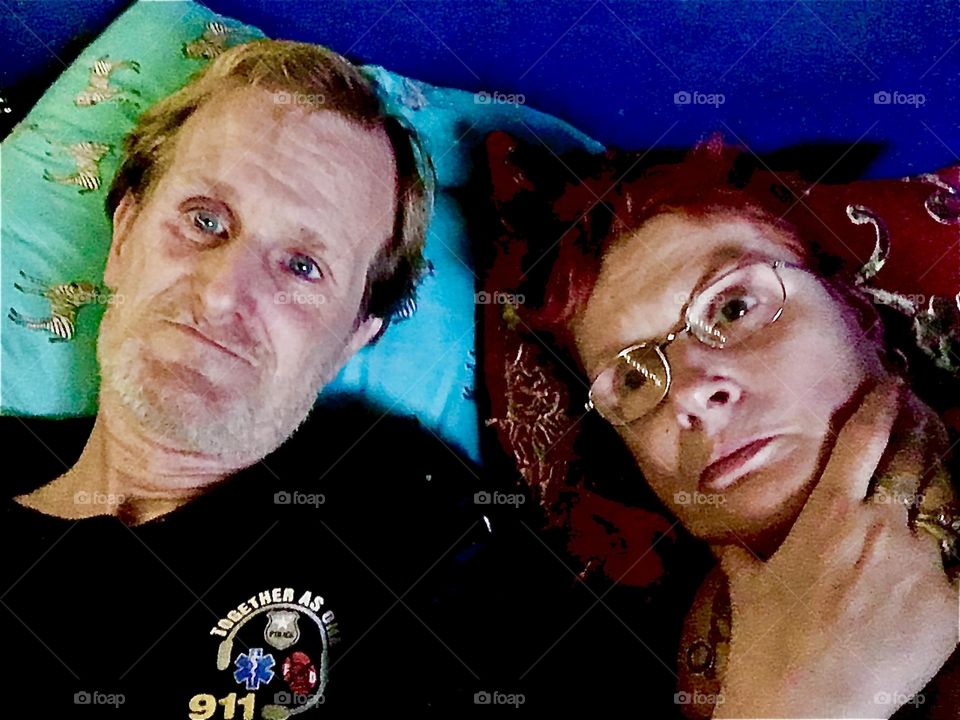 “Timothy Trespas”, my sweetheart and I, “Petra Schiller” reclining comfortably on our sofa bed from which we do most everything in autumn of 2019. Hypnotic Productions