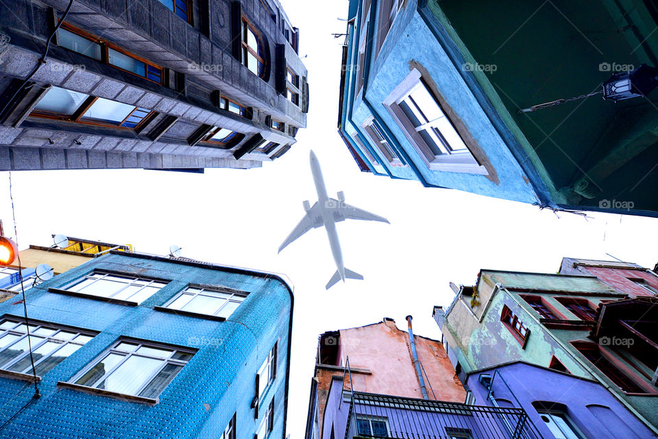 an airplane above the city