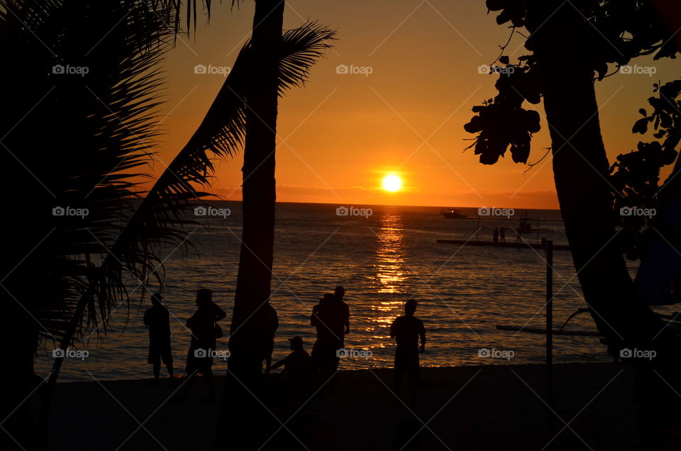 The view of the sunset over the Boracay island in the Philippines