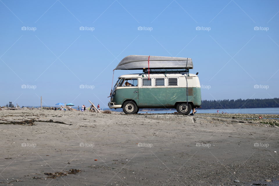 Old vehicles on the beach