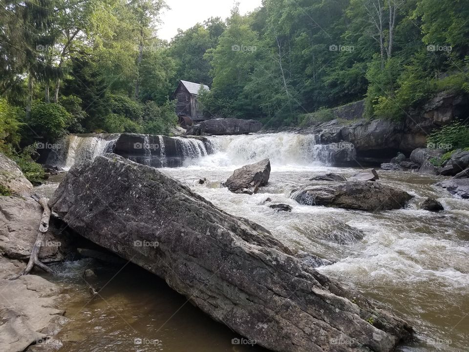 grist mill and swift moving stream