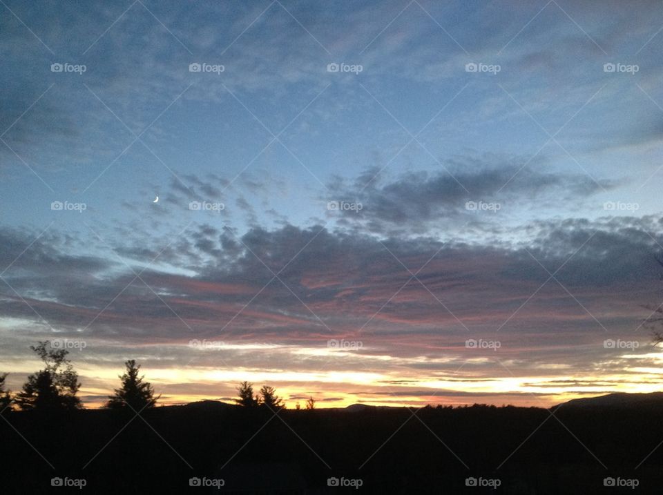 Crescent moon sunset