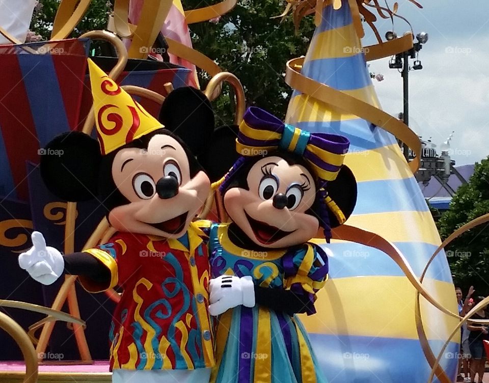 Mickey and Minnie Mouse on Parade at Walt Disney World.
