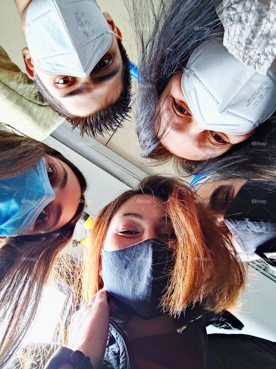 Fun family photo / Photo during the pandemic / Family / Nice friendly travelling family with masks on