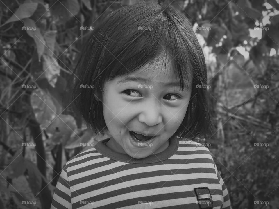 Funny face portrait of a little girl