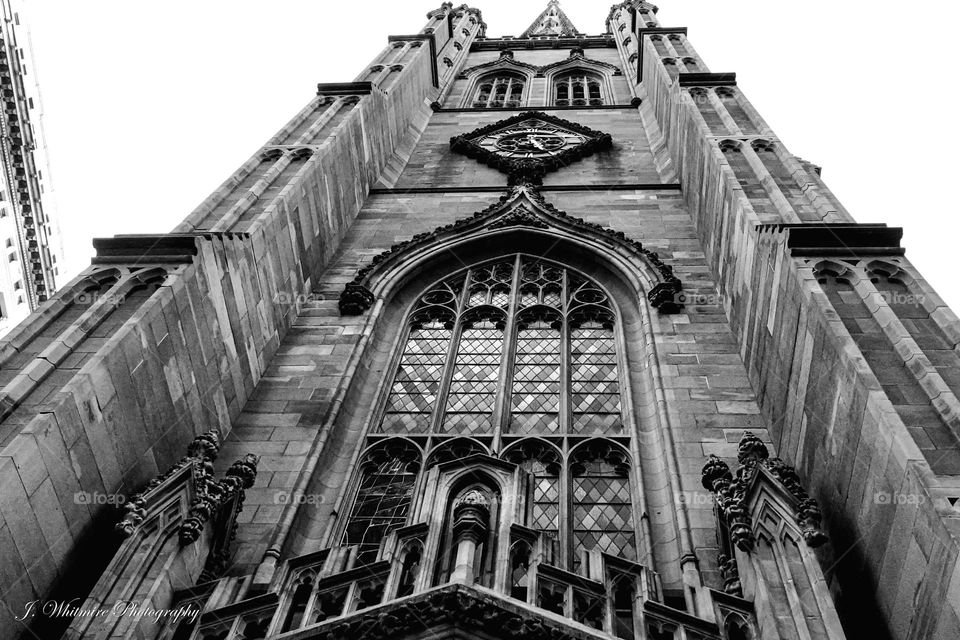 The classical design of the Trinity Church in New York City is very close to Wall Street, the financial epicenter of the American financial market