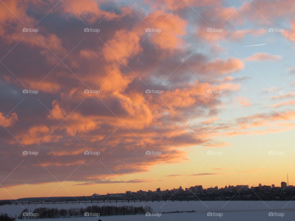 Epiphany evening, sunset in winter over the city