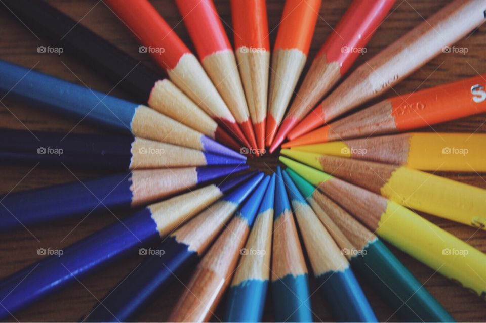 Multicolored pencils on the table