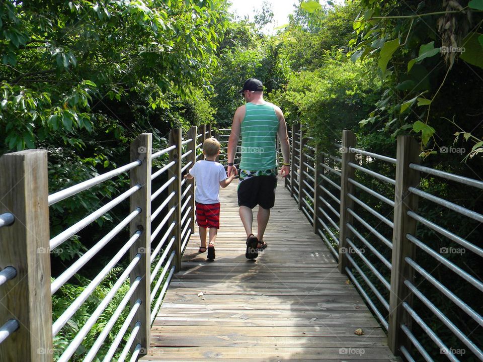 Father and son walking