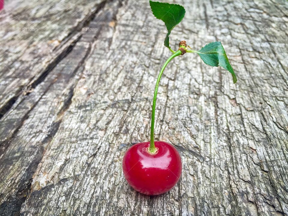 cherry on rustic wooden table