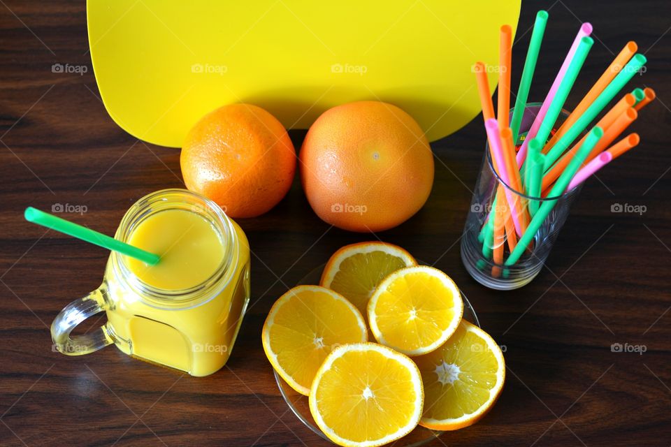 citrus fruits and juice wood top view background healthy food