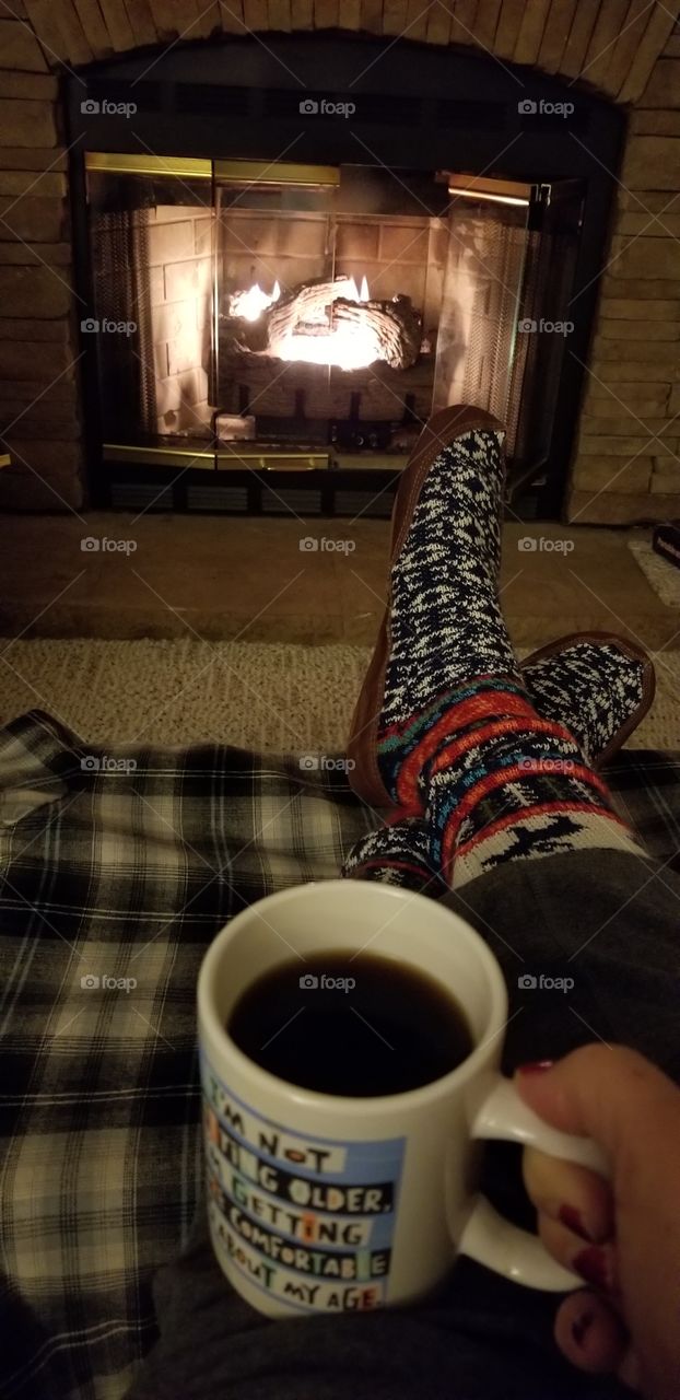 Relaxing by the fire with a hot cup of coffee with Acorn slippers
