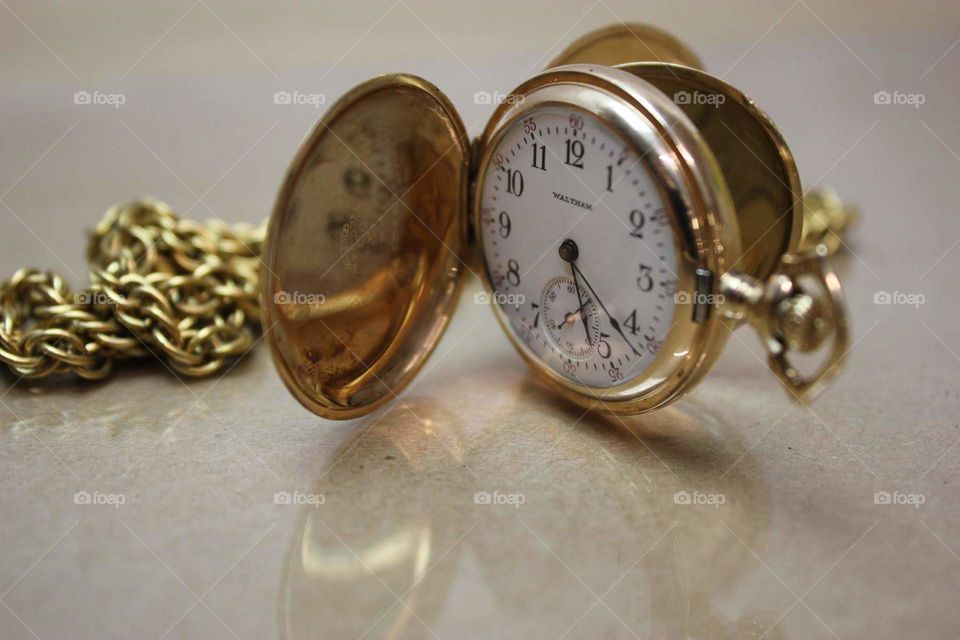 Vintage Waltham pocket watch with gold fob. Very steampunk, retro and classy.