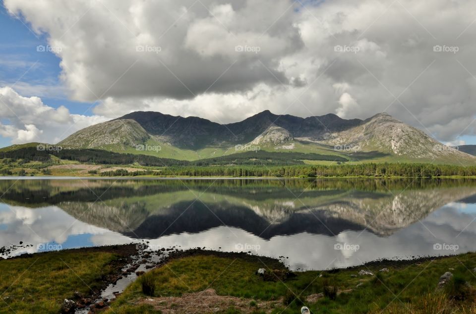 Reflected mountain range in water