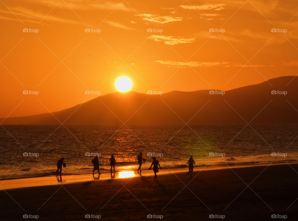 Playing under the sunset