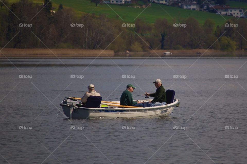 Three Old Men On A Boat